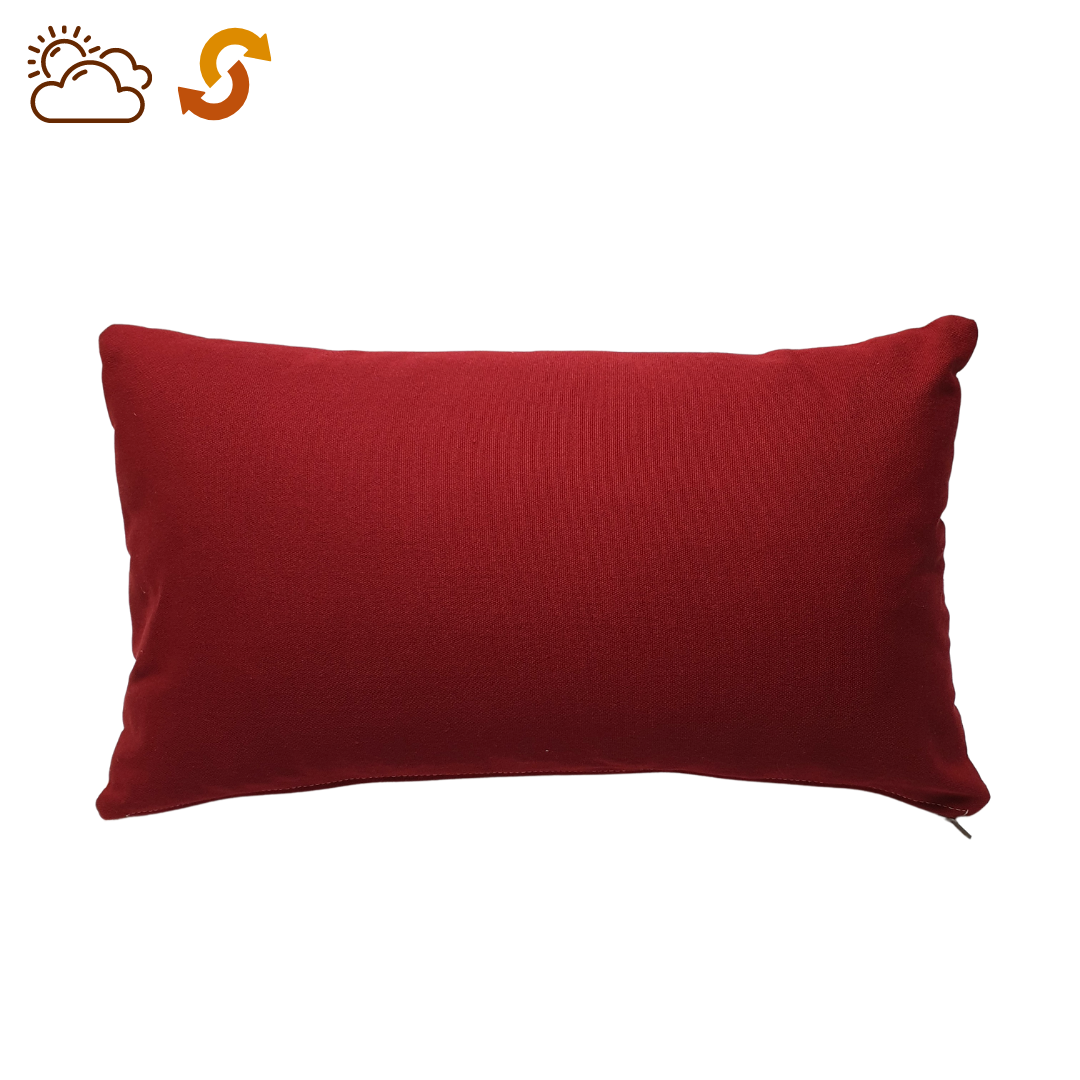 Face unie rouge bordeaux d'une housse de coussin d'extérieur dimensions 50x30 centimètres, fabriquée en France par l'atelier Larouquine, Bayonne, Pays basque